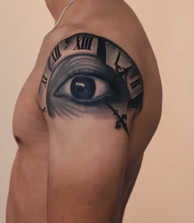 Black and grey realism tattoo by Damian Acosta