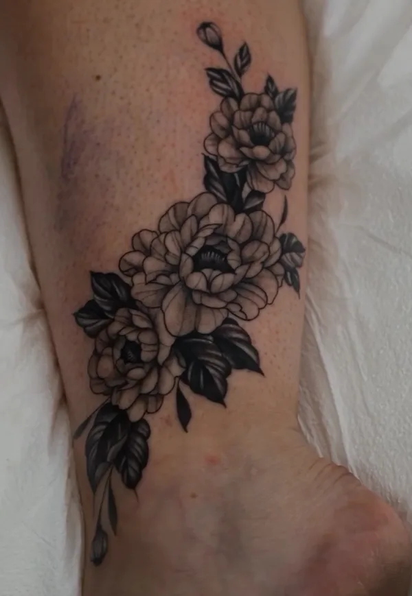 Black and grey realism tattoo by Damian Acosta